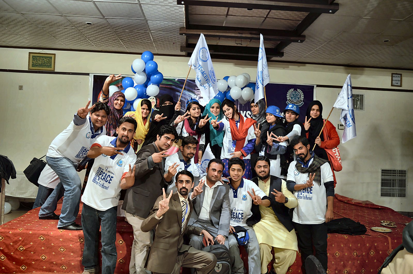 Youth volunteers celebrating at a PDO peace campaign